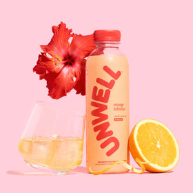 Unwell Hydration orange hibiscus pour shown for quick refreshing hydration.