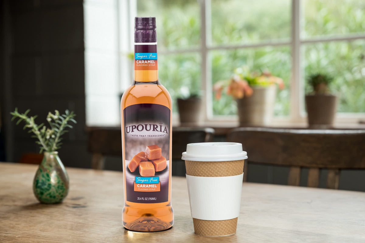 Coffee with caramel drizzle and Upouria syrup for a flavorful accent