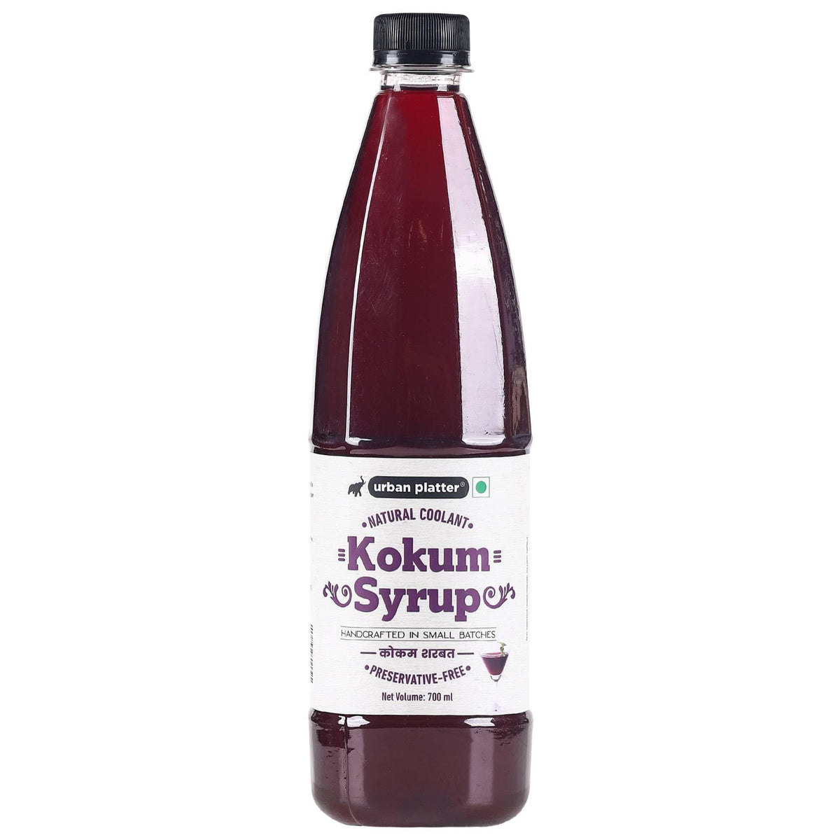 Urban Platter Kokum Syrup being poured into a glass for a tangy drink