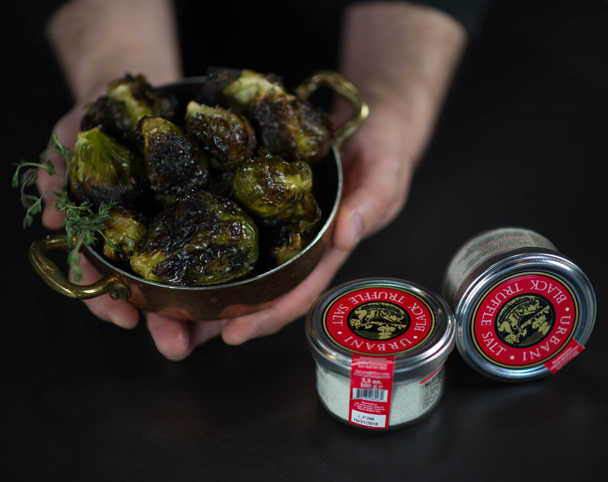 Urbani Truffles salt shaker on kitchen counter for quick finishing.