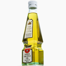 Urbani White Truffle Oil closeup highlights premium ingredients and color.