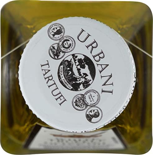 Urbani White Truffle Oil atop salad bowl adds savory depth.