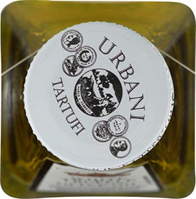 Urbani White Truffle Oil atop salad bowl adds savory depth.