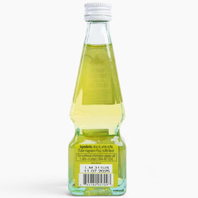 Salad drizzled with Urbani White Truffle Oil for gourmet aroma.