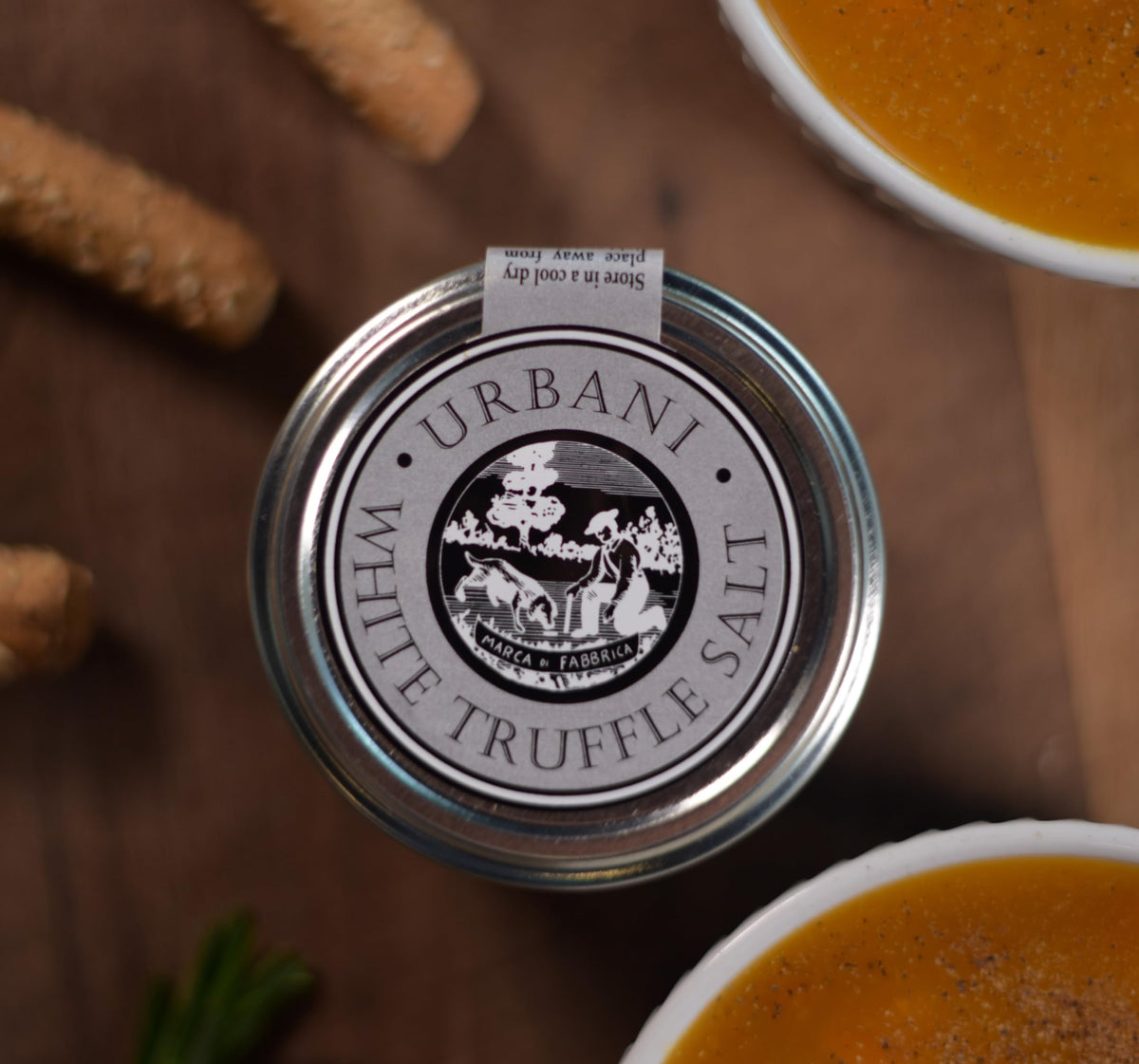 Urbani White Truffle Salt on eggs for enhanced savor.