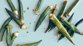 US Snacks Dried Okra Chips sea salt packaging back, no color added and no sugar added claim.