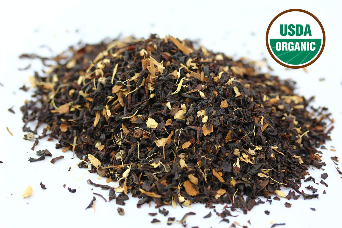 US Wellness Naturals brewed chai cup with steam suggests latte-ready experience.