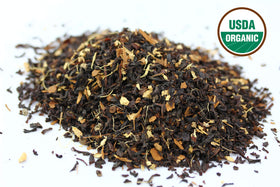 US Wellness Naturals brewed chai cup with steam suggests latte-ready experience.