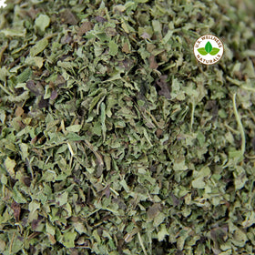 U.S. Wellness Naturals lemon balm white flowers on plant signal natural sweetness