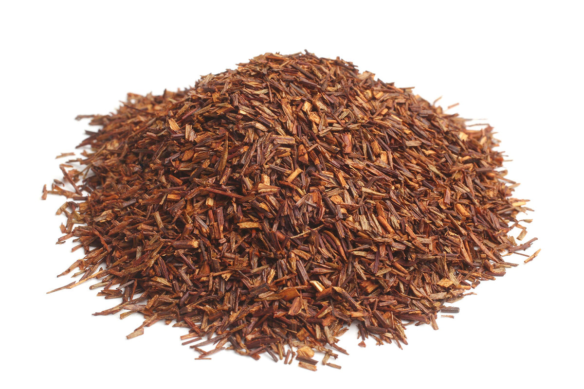 US Wellness Naturals Rooibos loose leaf close-up, vibrant red bush herbs for rich aroma.