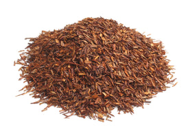 US Wellness Naturals Rooibos loose leaf close-up, vibrant red bush herbs for rich aroma.