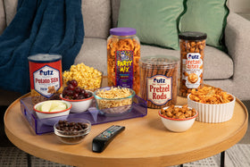 Utz Party Mix bulk barrel shown as party snack option