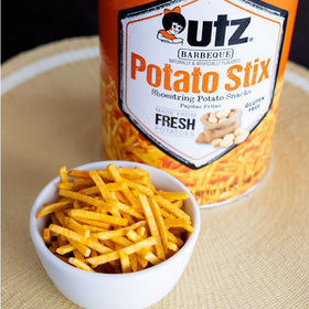 Utz Potato Stix BBQ closeup shows seasoned sticks and even coating for gluten-free snacking.