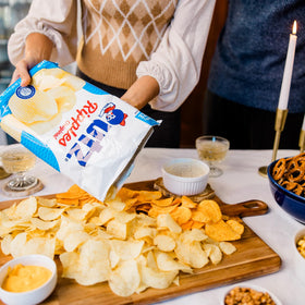 Utz Salt & Vinegar bag close-up ideal for savory snacking.