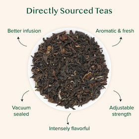 VAHDAM Darjeeling loose leaves close-up highlighting delicate texture and aroma.