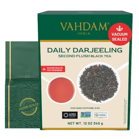 VAHDAM Darjeeling front packaging showcases premium leaves for refined aroma.