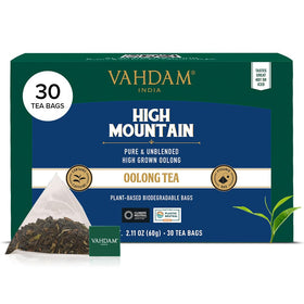 VAHDAM High Mountain Oolong tea bag steeping in cup, aromatic brew.