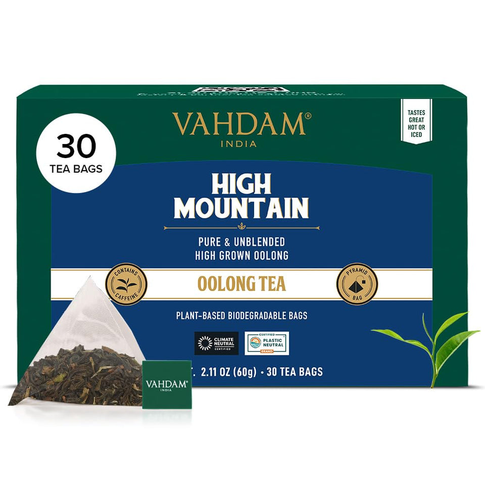 VAHDAM High Mountain Oolong tea bag steeping in cup, aromatic brew.