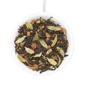 VAHDAM Maharani Chai spice blend close-up with cardamom and cinnamon notes.
