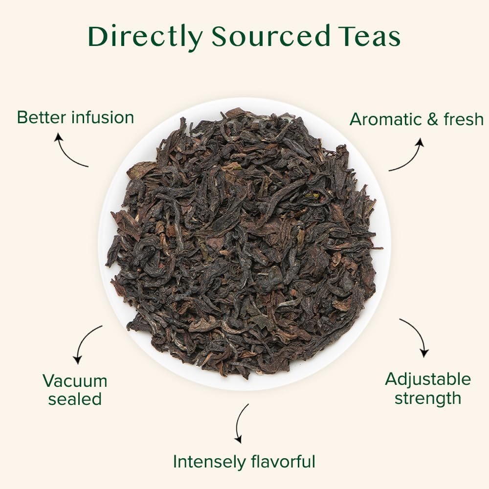 VAHDAM oolong tea leaves close up releasing delicate aroma.