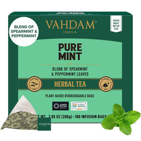 VAHDAM Pure Mint tea bags showing fresh spearmint and peppermint for a caffeine-free brew