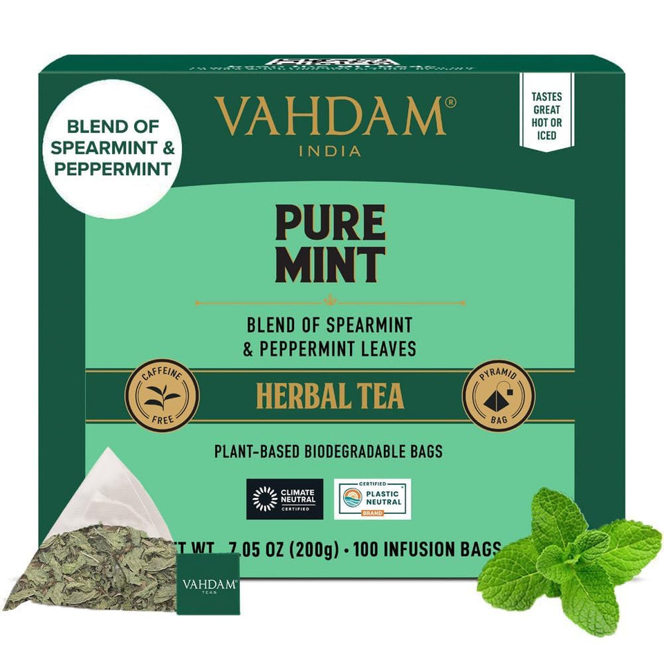 VAHDAM Pure Mint tea bags showing fresh spearmint and peppermint for a caffeine-free brew