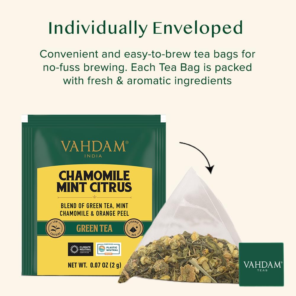 VAHDAM pyramid-shaped tea bags releasing full flavor during steeping.