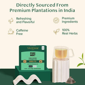 VAHDAM pyramid tea bags unfurling to release minty flavor