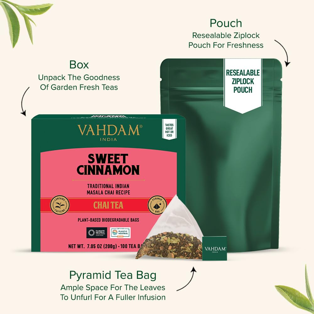 Crushed cardamom beside VAHDAM chai for aromatic spice notes.