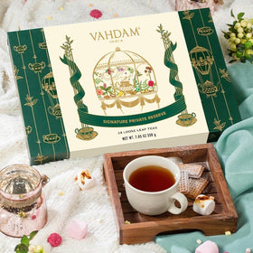 Fresh VAHDAM loose leaf teas steeping to release rich aromas.