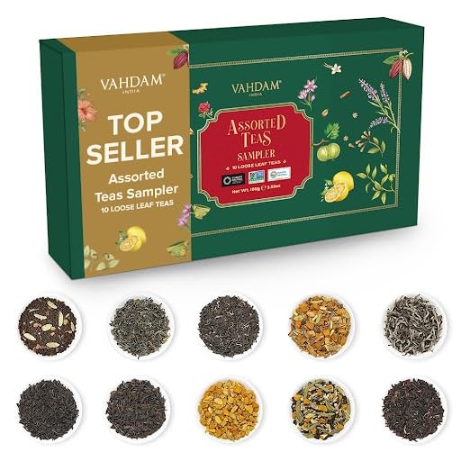 VAHDAM Top 10 Favourites Tea Sampler Set package shows a premium loose-leaf collection for gifting.