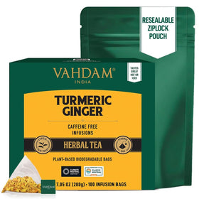 VAHDAM turmeric-ginger tea cup steaming, inviting warm comfort any time of day