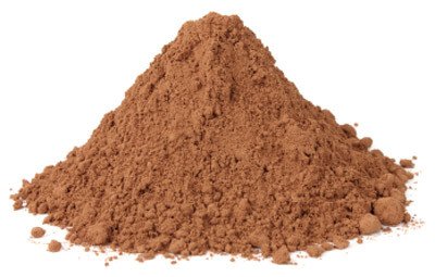 Valrhona 159 cocoa powder in a scoop shows a rich red mahogany color for baking and beverages.