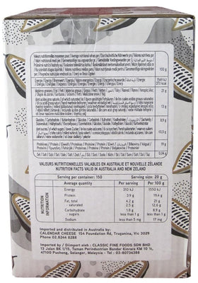 Valrhona cocoa powder in hot chocolate cup signaling rich flavor for cozy drinks