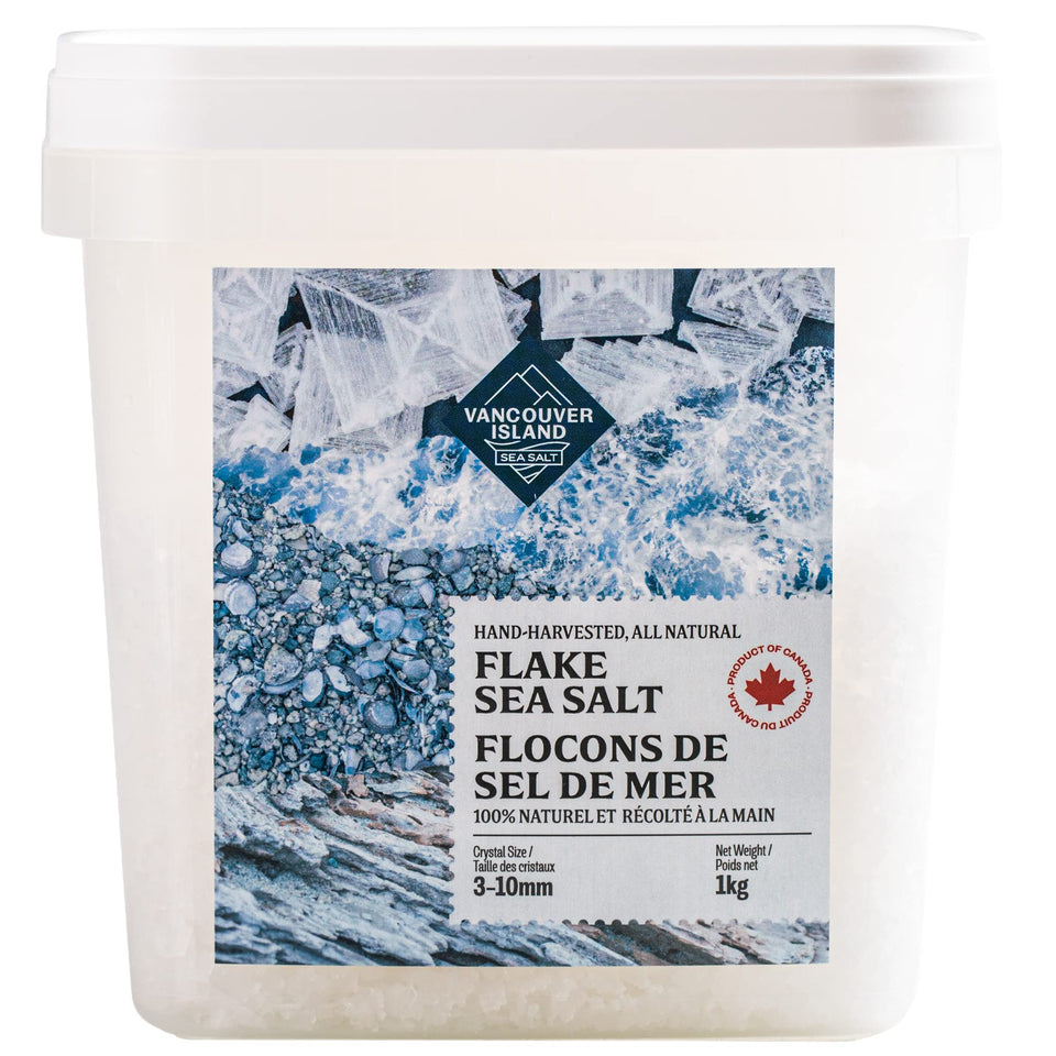 Vancouver Island Sea Salt bulk flakes on steak for bold finishing flavor.