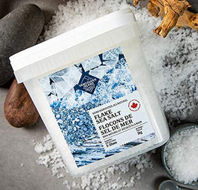 Vancouver Island Sea Salt crystals on seafood for bright, clean taste.