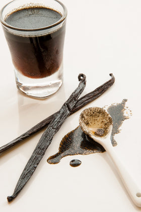 Vanilla Bean Kings bottle pour captures maple-syrup-like consistency for easy measuring.