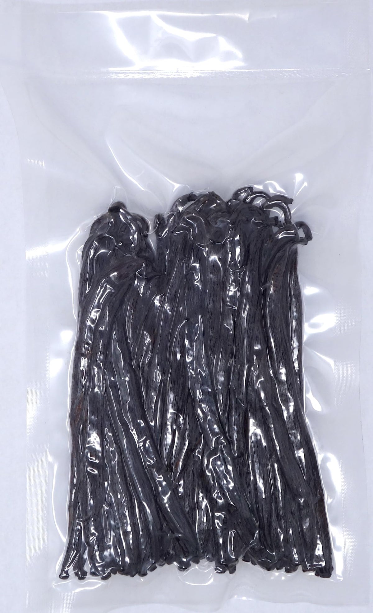 Vanilla Products USA Grade B vanilla beans closeup: seeds visible for rich flavor.