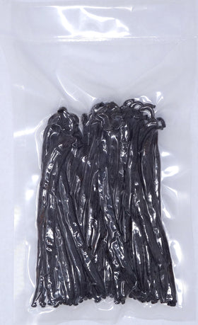 Vanilla Products USA Grade B vanilla beans closeup: seeds visible for rich flavor.