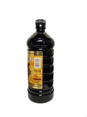 Vanilla Totonacs bottle with pour spout shows dark extract