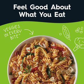 Cauliflower-lentil-peas rotini bowl with vibrant veggies and fiber-rich goodness.