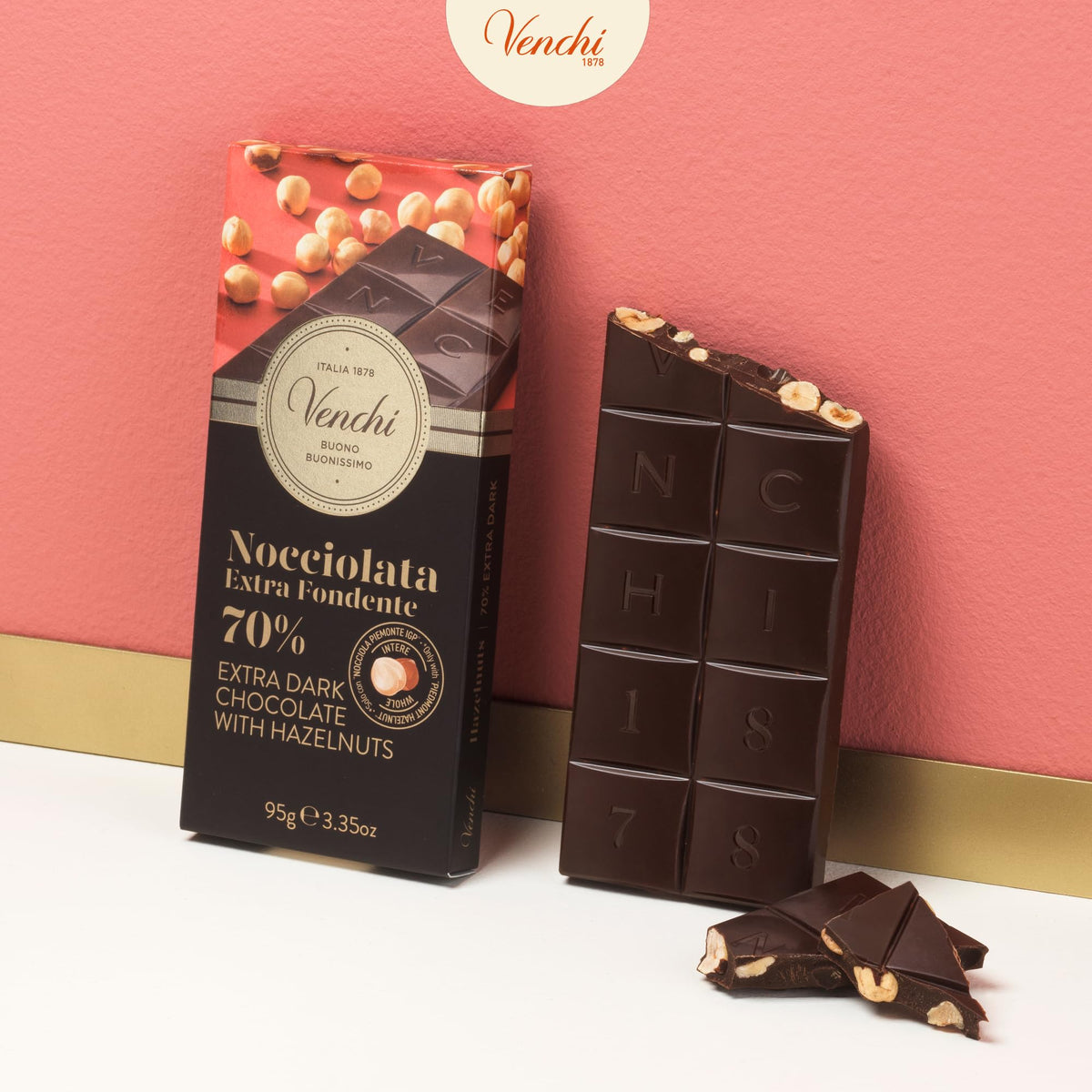 Venchi 70% dark chocolate hazelnut bar closeup shows crunchy Piedmont hazelnuts