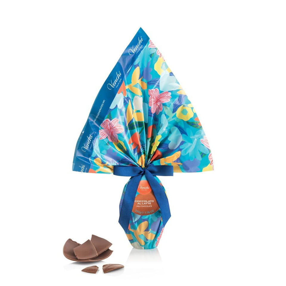 Venchi milk chocolate egg with vibrant wrapper, a delightful spring gift idea.