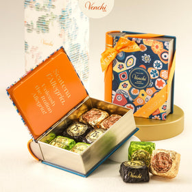 Venchi Murrine mini book tin with Crema Cacao, luxurious chocolate experience