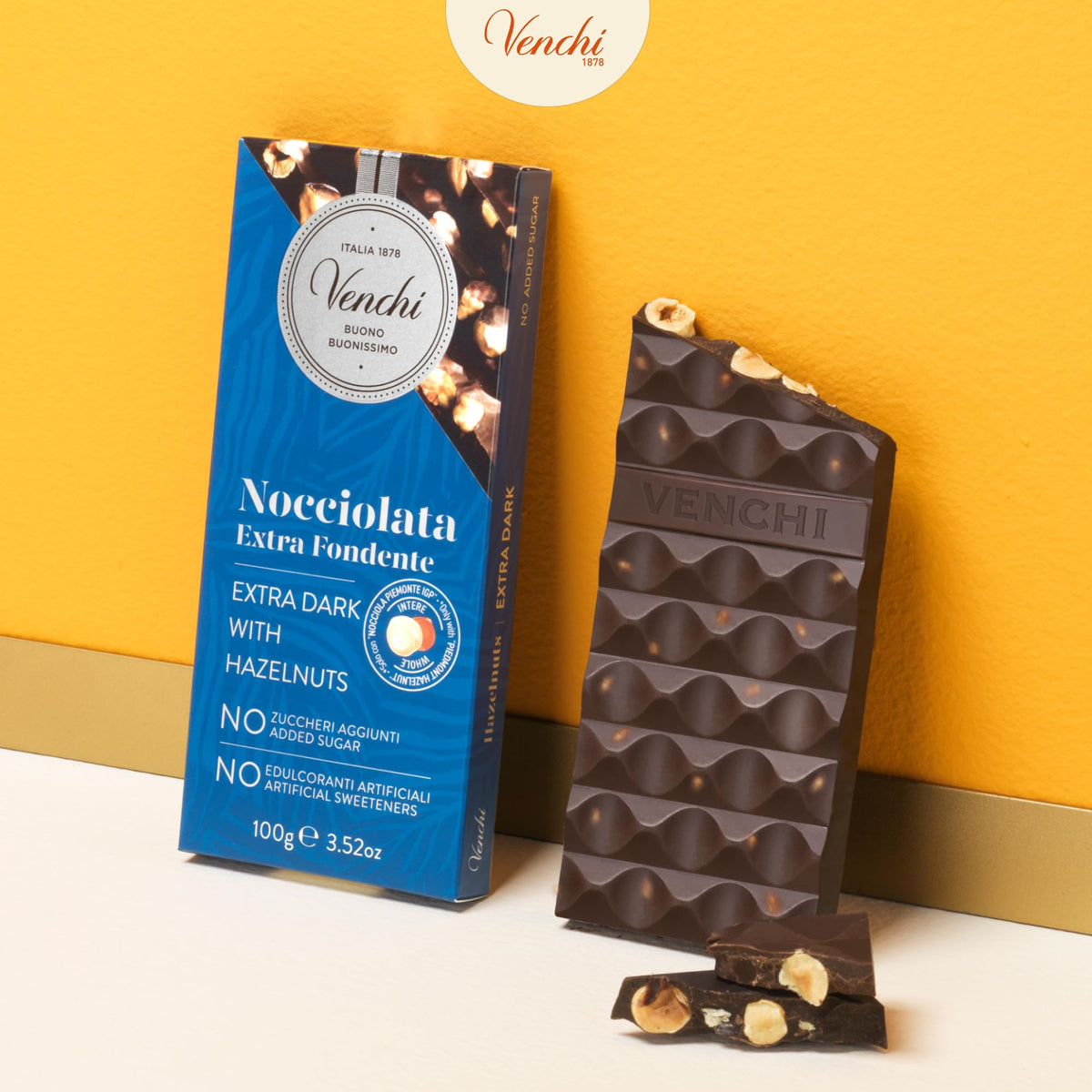 Venchi NO Added Sugar Dark Hazelnut Bar cross-section reveals whole Piedmont hazelnuts