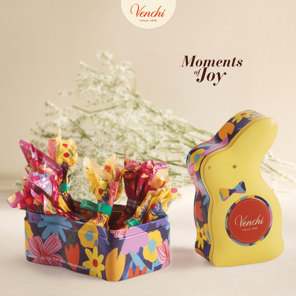 Venchi spring collection artwork by Teresa Rego, vivid design on the tin.