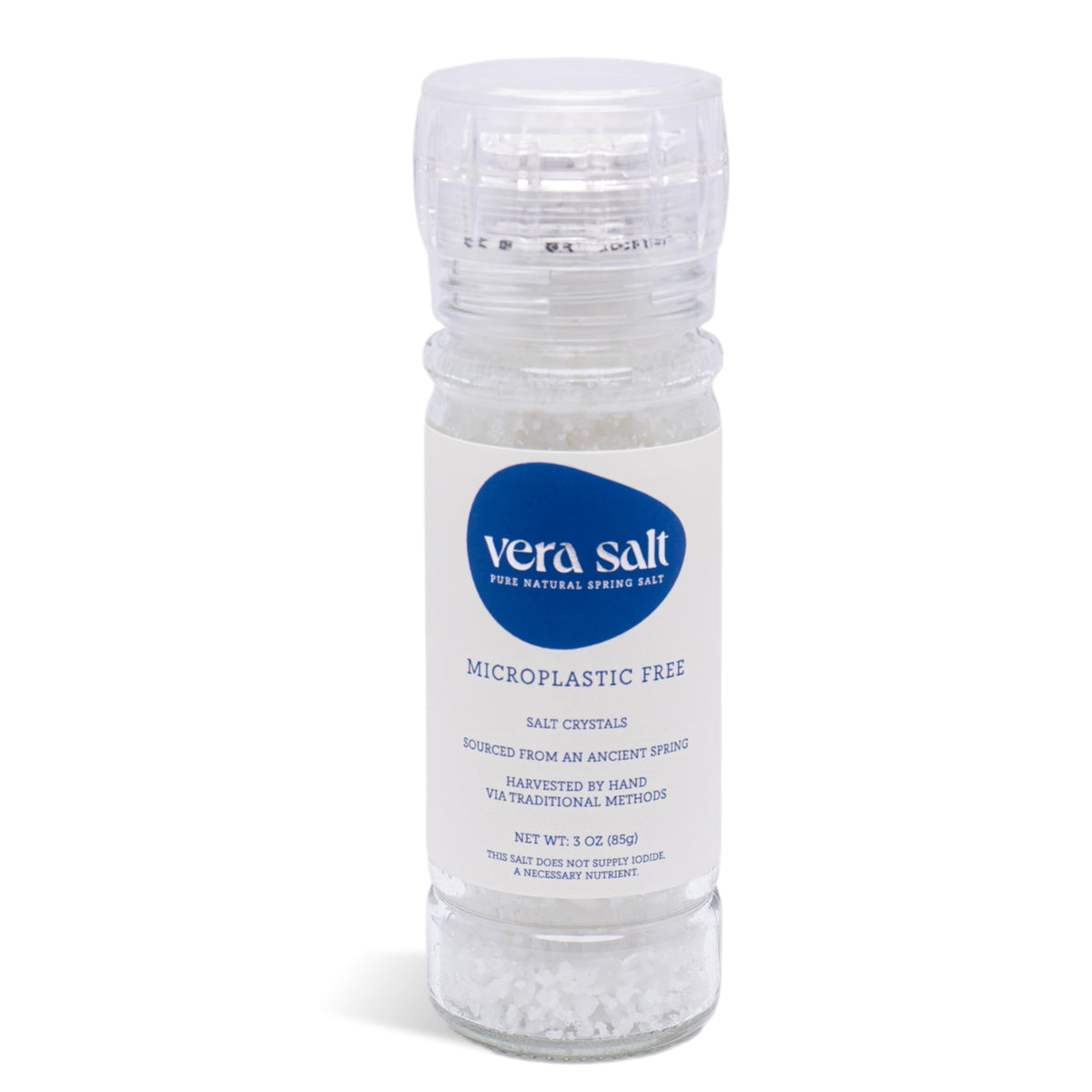 Vera Salt coarse spring salt crystals inside a glass bottle for fresh table grinding.
