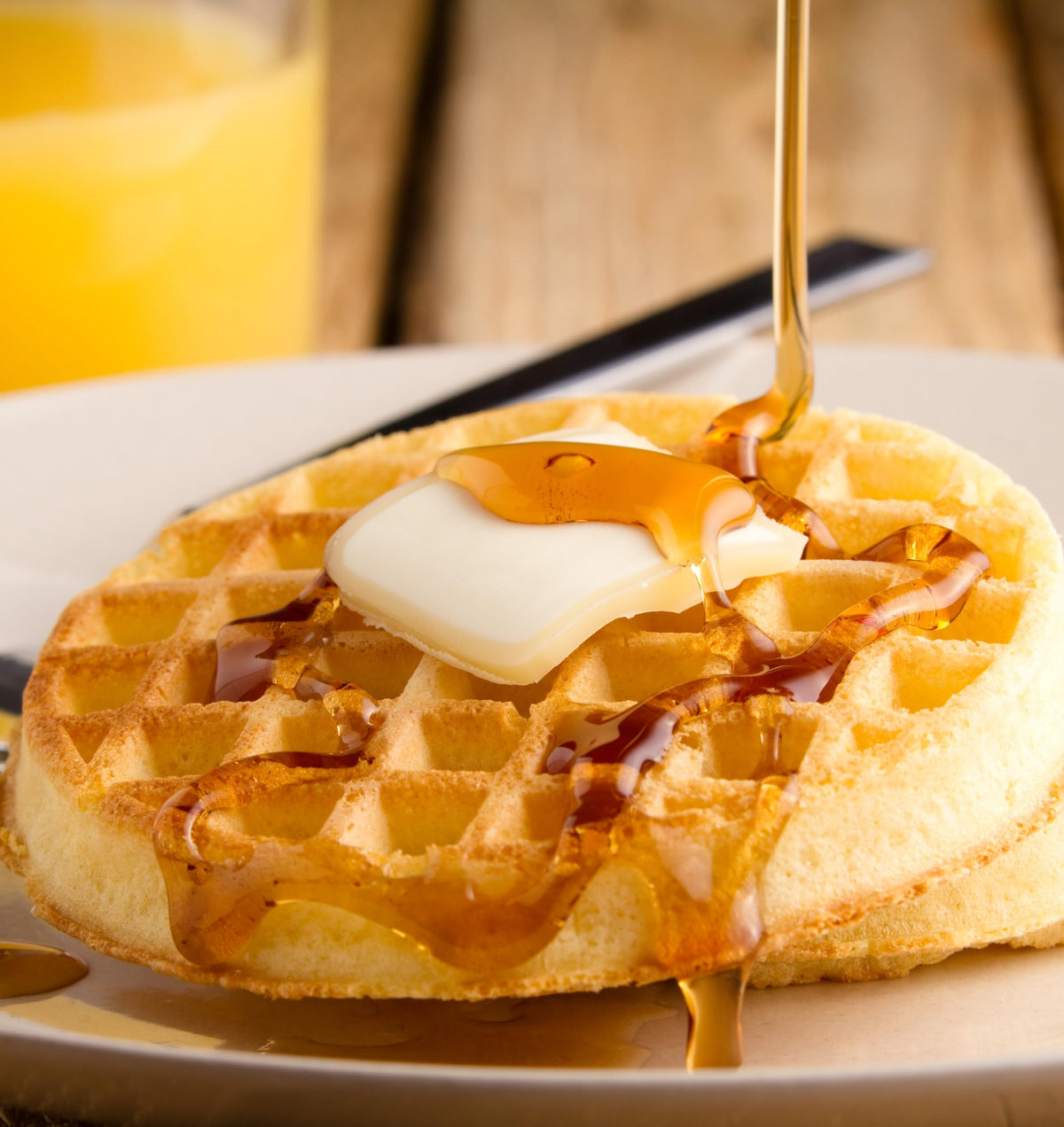 Vermont Maid Original Syrup on pancakes for a family friendly breakfast