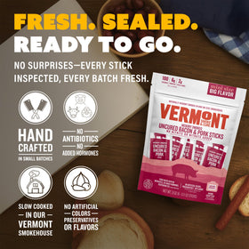 Vermont Smoke & Cure 1oz stick in hand demonstrates portable snack size.