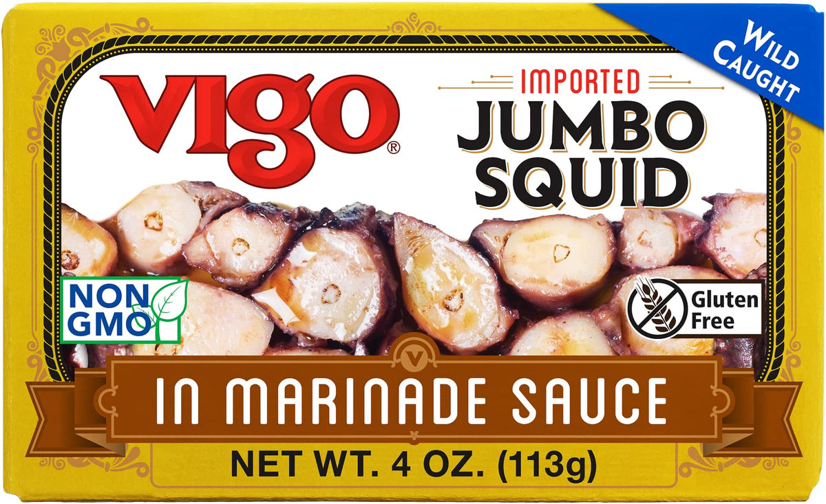 Vigo jumbo squid in marinade closeup showing tender texture and savory oil-infused seasoning.